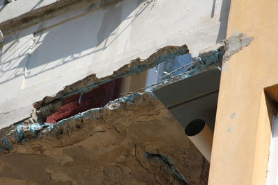 Low angle view of damaged building