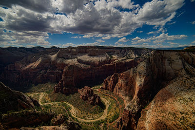 Aerial view of landscape against dramatic sky