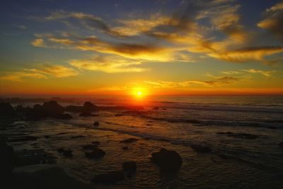 Scenic view of sea against sky during sunset