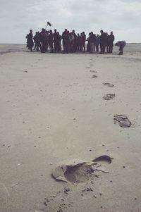 Woman standing on beach