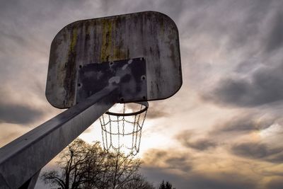 Low angle view of basketball hoop against sky