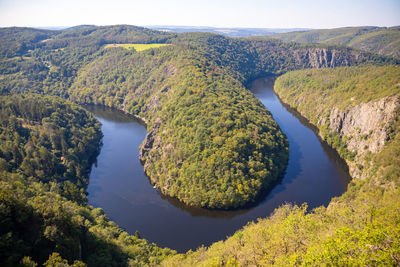 High angle view of lake amidst mountains