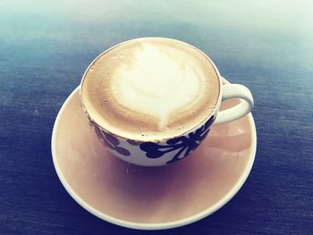 High angle view of cappuccino on table