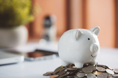 Close-up of coins on table