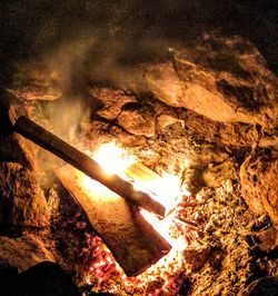 Close-up of bonfire on tree at night