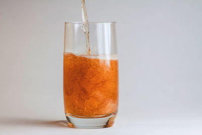 Close-up of drink in glass on table