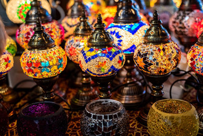 Close-up of various decoration in market for sale