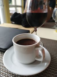 Close-up of coffee cup on table