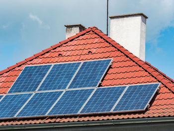 Low angle view of roof of building against sky