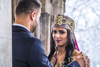 Bride with bridegroom during weeding ceremony