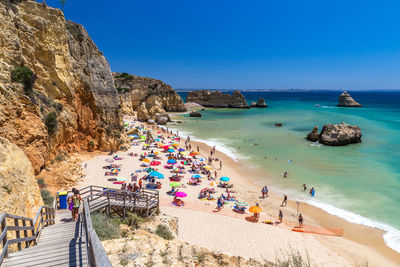 High angle view of people on beach against sky