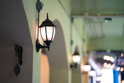 Low angle view of illuminated light bulb