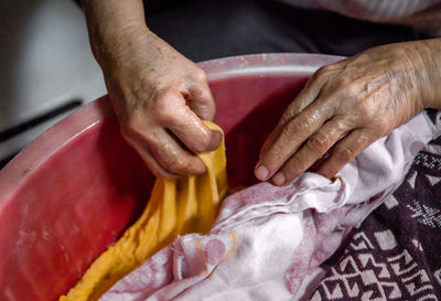 The preparation of a traditional food, sweet fritter called filhós from portugal. christmas time. 