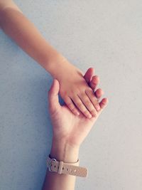 Close-up of hand holding hands