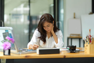 Woman working at table