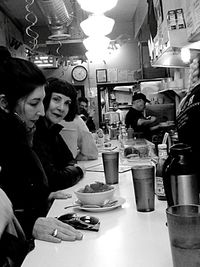 Woman looking at restaurant