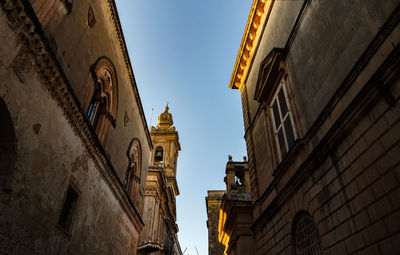 Low angle view of buildings against sky