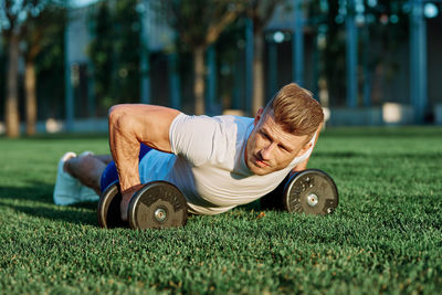 Man exercising in park