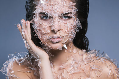 Low angle view of woman wearing mask