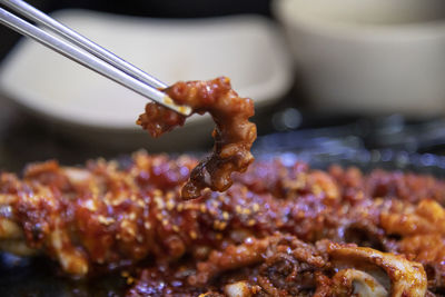 Close-up of meat on barbecue grill