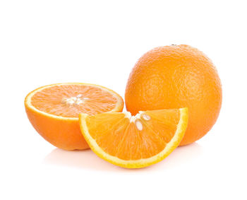 Close-up of orange fruit against white background