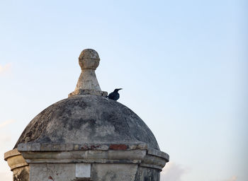 Low angle view of statue against clear sky