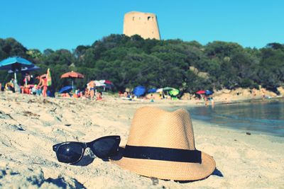 Scenic view of beach against clear sky