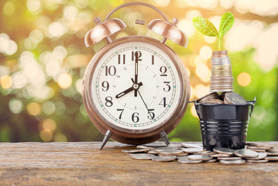 Close-up of clock on table