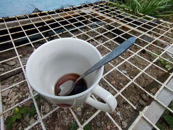 High angle view of coffee cup on table