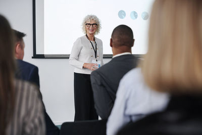 Woman having presentation during business meeting