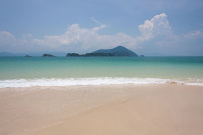 Scenic view of beach against sky