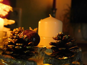 Close-up of candles on table