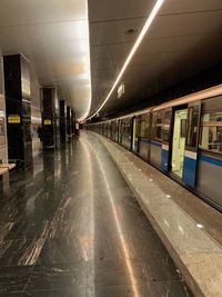 Train at railroad station in city