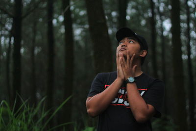 Portrait of teenage girl in forest