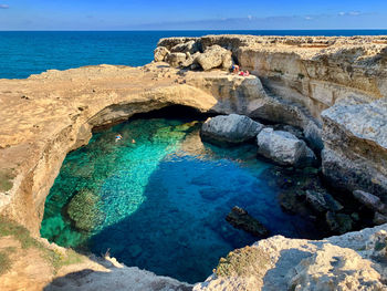 High angle view of rocks on beach in puglia