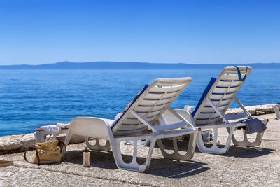 Deck chair on the beach in brela, croatia