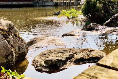 Reflection of rocks in water