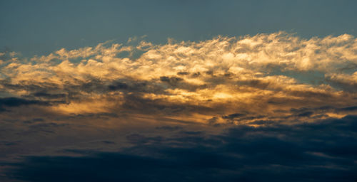 Low angle view of clouds in sky during sunset