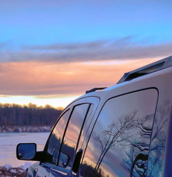 Car against sky during sunset