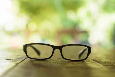 Close-up of eyeglasses on table