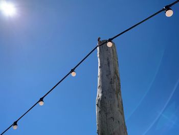 Low angle view of street light against clear sky