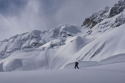 Scenic view of snow covered mountains