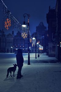 Woman walking on city street