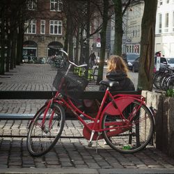 People on sidewalk in city