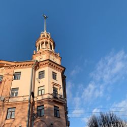 Low angle view of building against blue sky