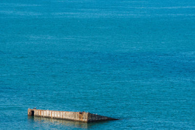 High angle view of abandoned blue sea