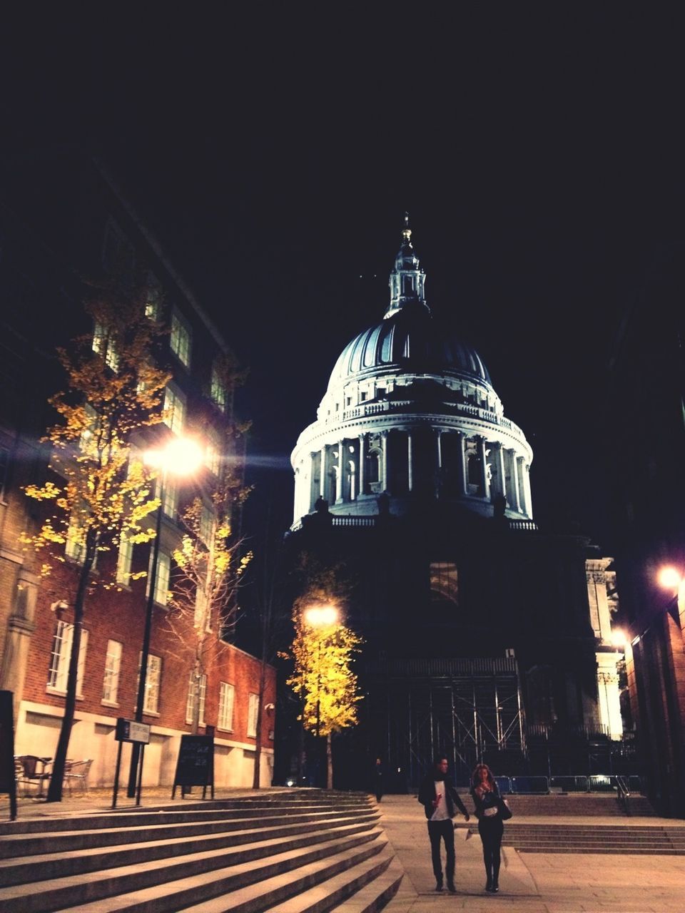 building exterior, architecture, built structure, religion, place of worship, spirituality, church, illuminated, night, cathedral, dome, sky, travel destinations, city, famous place, men, facade