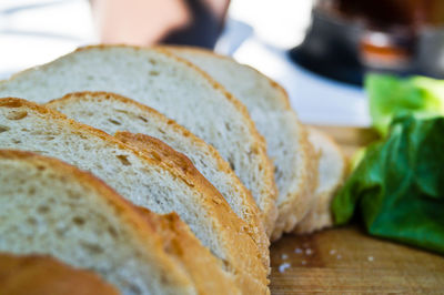 Close-up of bread slices on cutting board