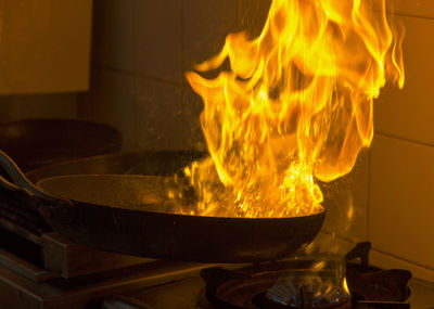 Close-up of fire on barbecue grill