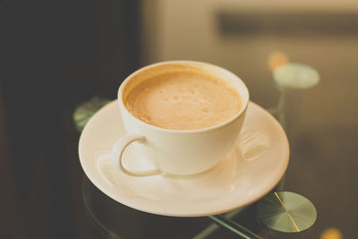 Close-up of cappuccino on table